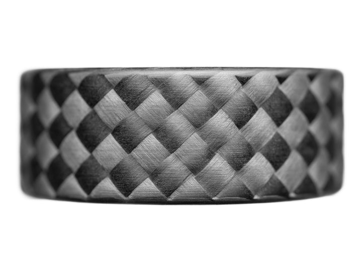 Straight-on side profile of the WeaveForce Vertex ring highlighting the bold 45-degree woven carbon fiber design.