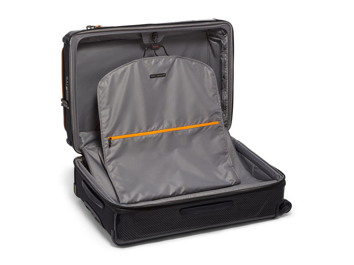 Interior view of TUMI | McLaren Aero Extended Trip Packing Case with garment sleeve and pockets.