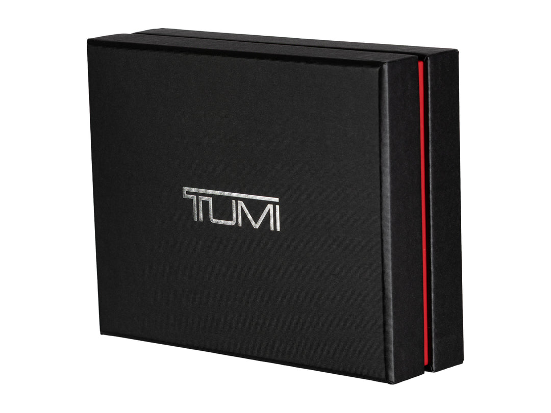 TUMI McLaren wallet shown with packaging box, emphasizing luxury presentation and gift-readiness