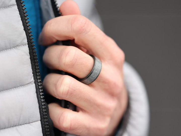 Boston carbon fiber and concrete ring on hand