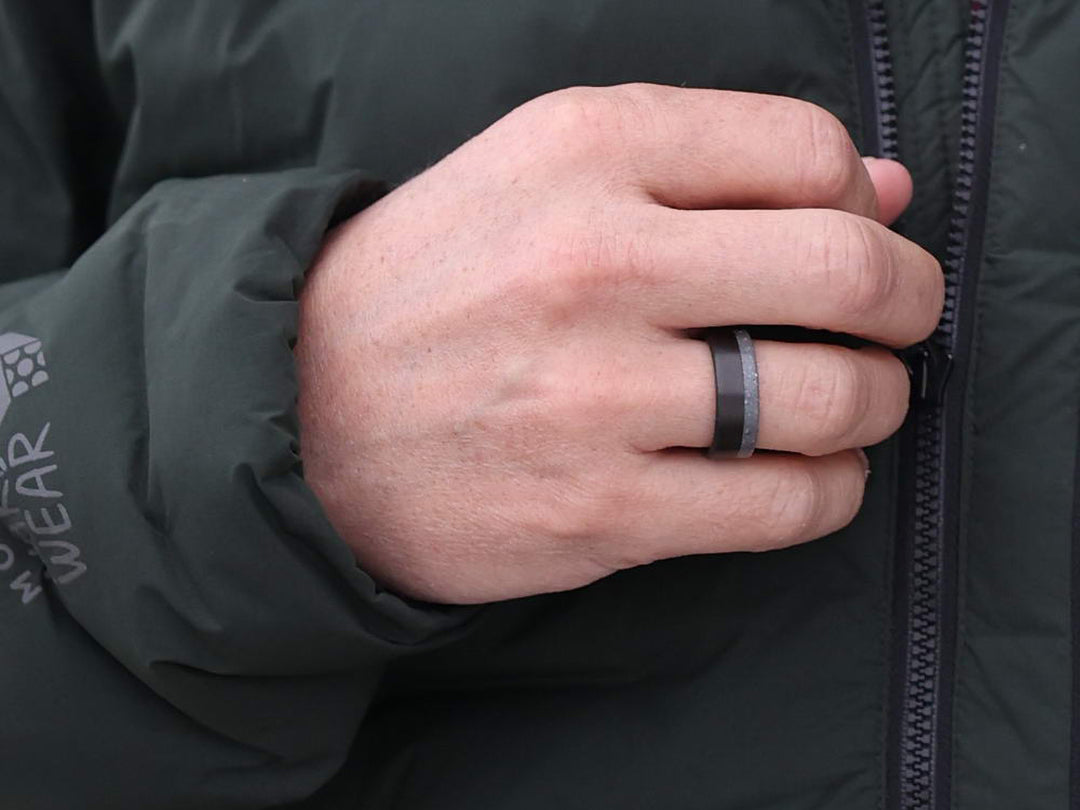 Detroit carbon fiber and concrete ring on hand