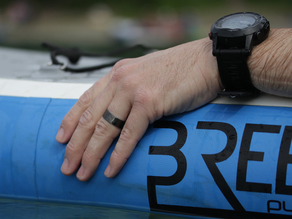 Bullet carbon fiber ring on hand
