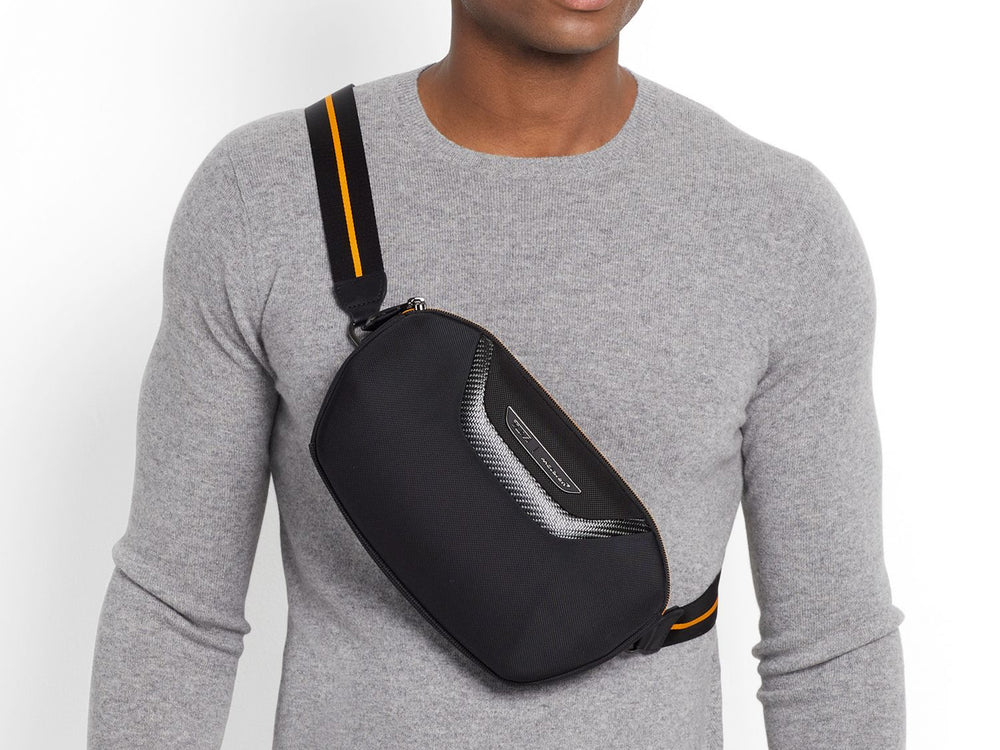 TUMI | McLaren Lumin Utility Pouch, on chest