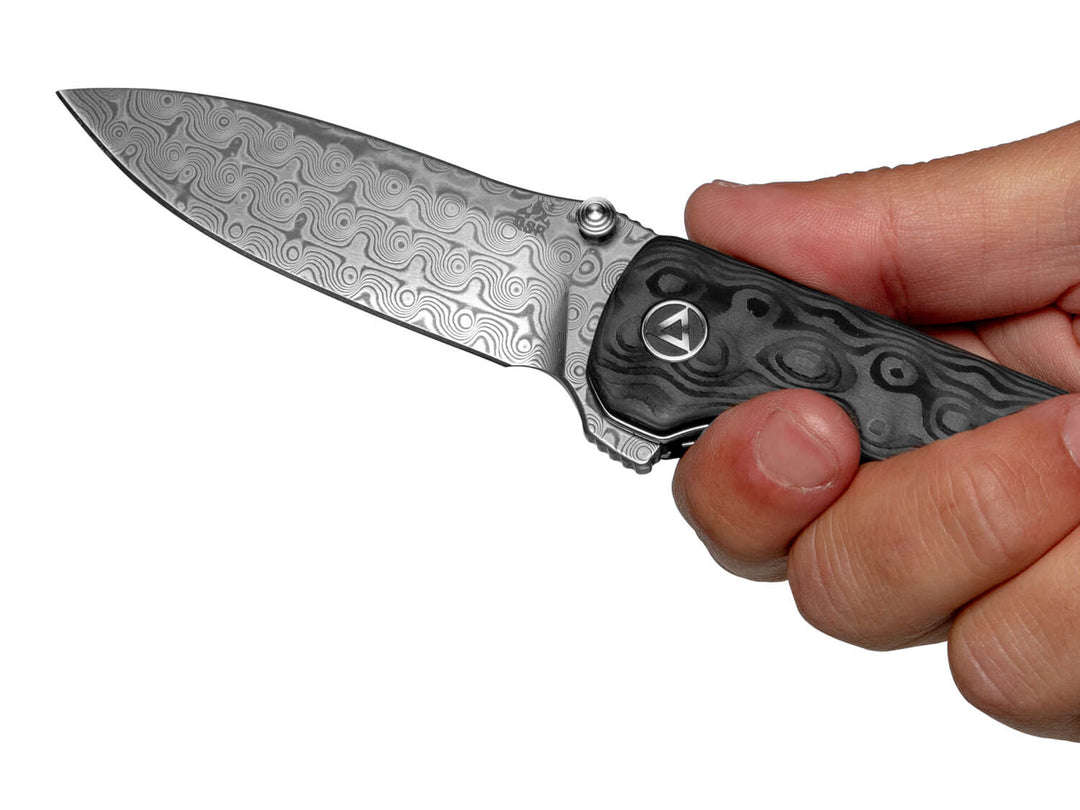 Holding QSP Hawk Raindrop Carbon Fiber & Damascus Steel Liner Lock Knife