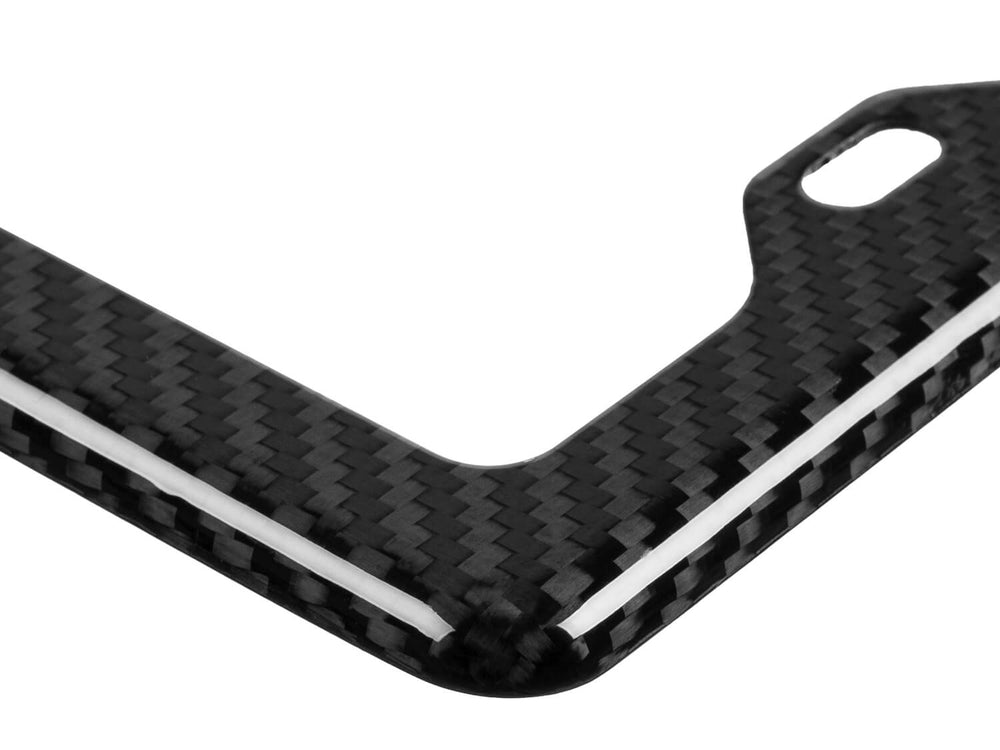 Up close on gloss finish carbon fiber 4-hole license plate frame