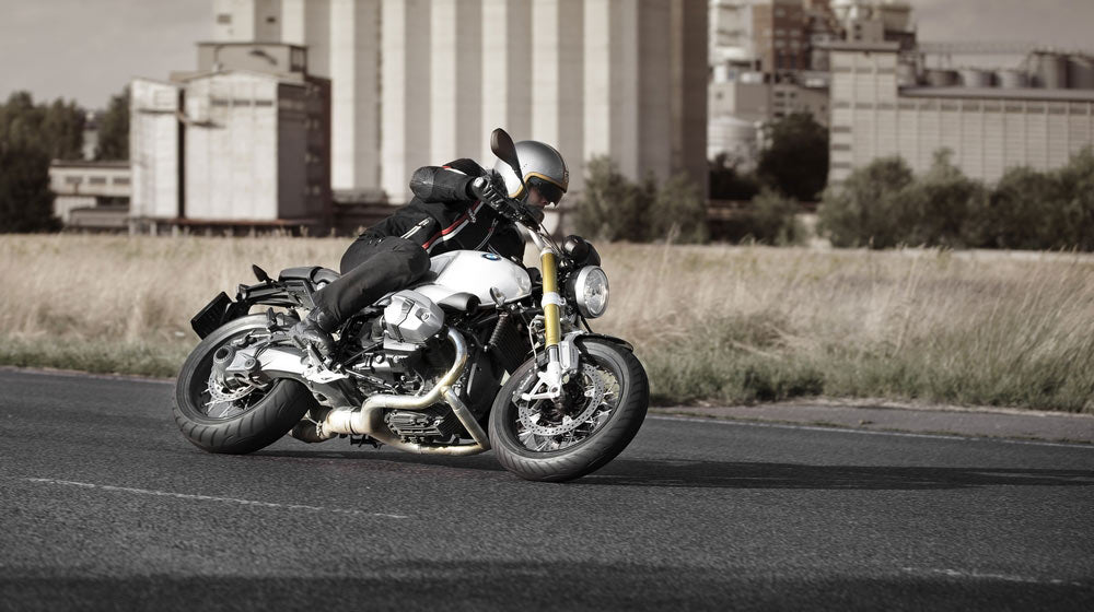 A man driving his BMW motorcycle | Feature | BMW-To-Mass-Produce-Carbon-Fiber-Bolt-On-Motorcycle-Frame