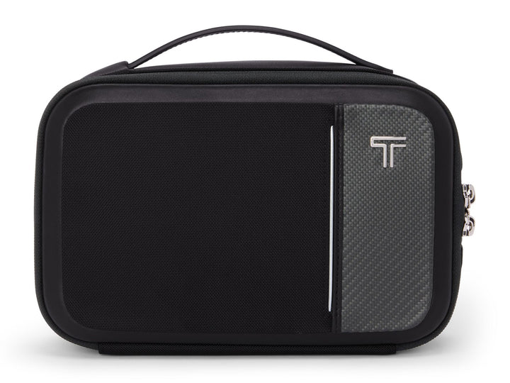 TUMI Arrivé Richards travel kit with carbon fiber panel and leather handle front view