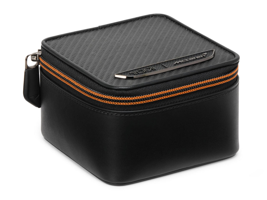 TUMI x McLaren Watch Case with CX6 carbon fiber top panel and signature Papaya orange zipper