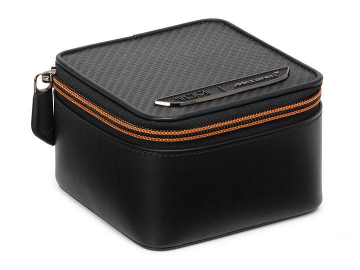 TUMI x McLaren Watch Case with CX6 carbon fiber top panel and signature Papaya orange zipper