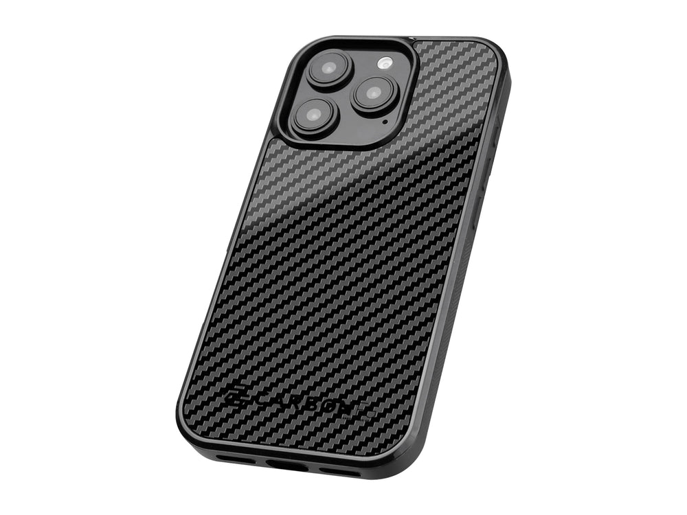 CarboFend iPhone case at an angle showing the 3K carbon fiber back panel texture and raised camera protection ring