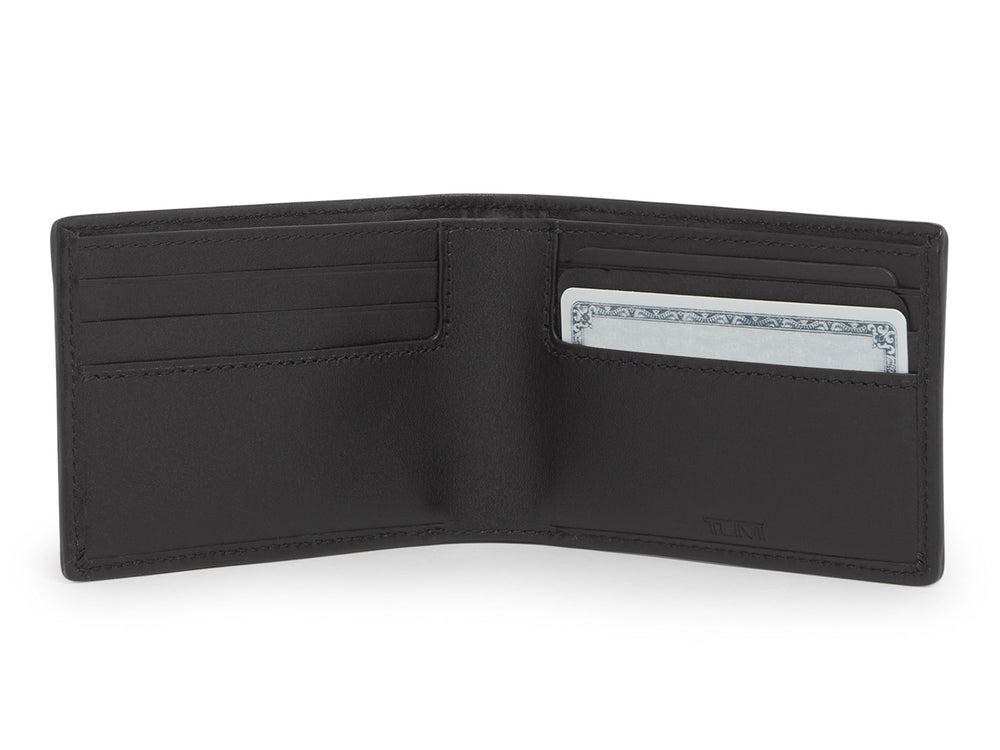 Interior view of the TUMI McLaren Slim Single Billfold Wallet, featuring six card slots and a single bill compartment in a minimalist design