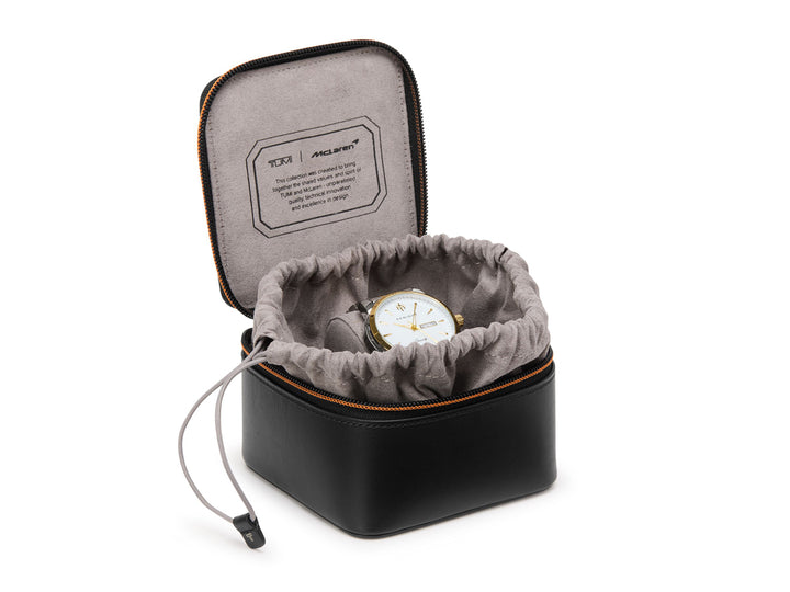 TUMI x McLaren Watch Case interior showing microfiber lining, drawstring closure, and luxury watch storage