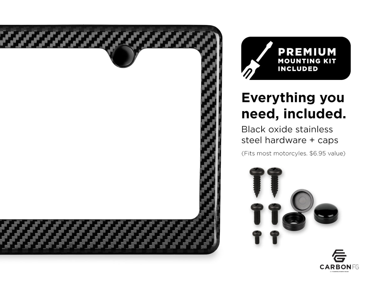 Carbon fiber license plate frame with included black oxide stainless steel hardware and caps, shown with premium mounting kit contents
