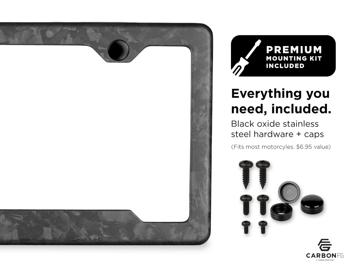 Carbon fiber license plate frame with included black oxide stainless steel hardware and caps, shown with premium mounting kit contents