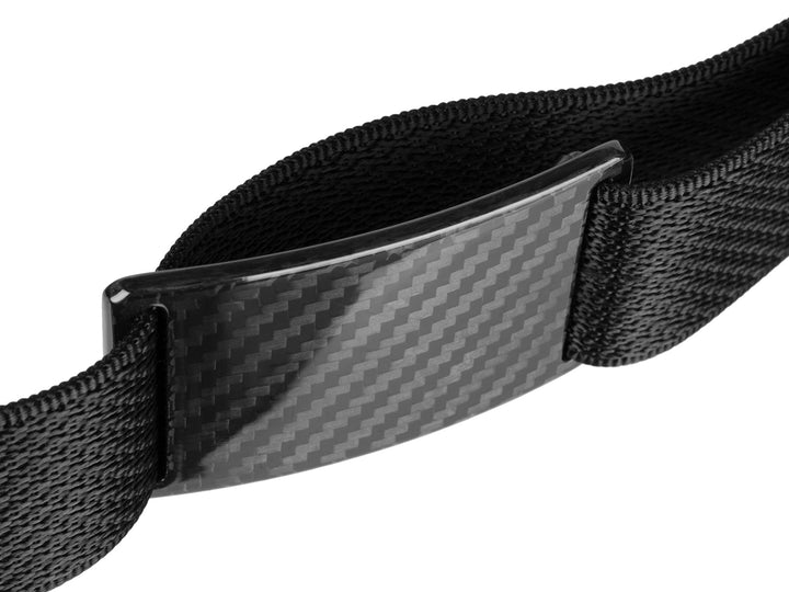 Angled view of the Grip6 carbon fiber belt showing the buckle's twill weave pattern and the durable black nylon strap.