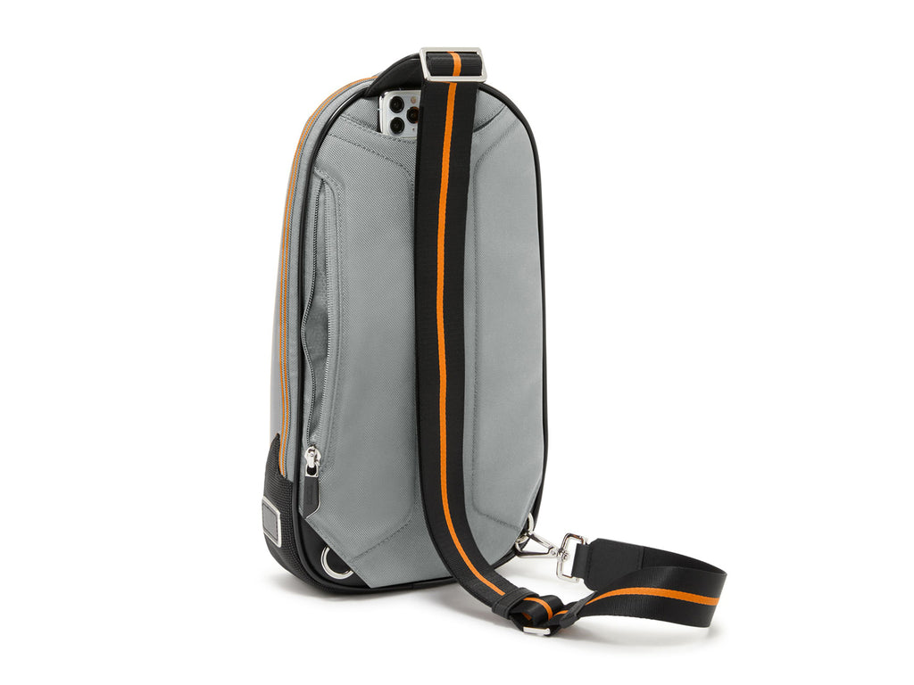 Back view of Torque Sling with vertical zip pocket and McLaren signature orange-striped strap