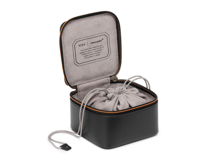 TUMI x McLaren Watch Case interior featuring TUMI McLaren collaboration plaque and clinched drawstring closure system