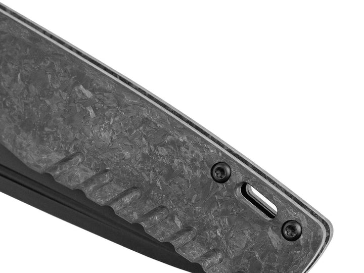 Detailed shot of forged carbon texture and lanyard hole on Tekto F3 Charlie knife handle