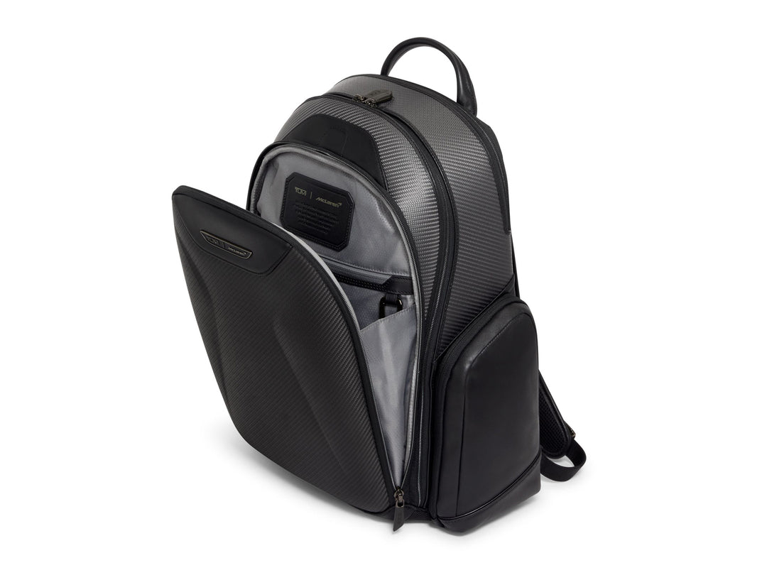 Backpack with front compartment open, revealing inner pockets and storage options.