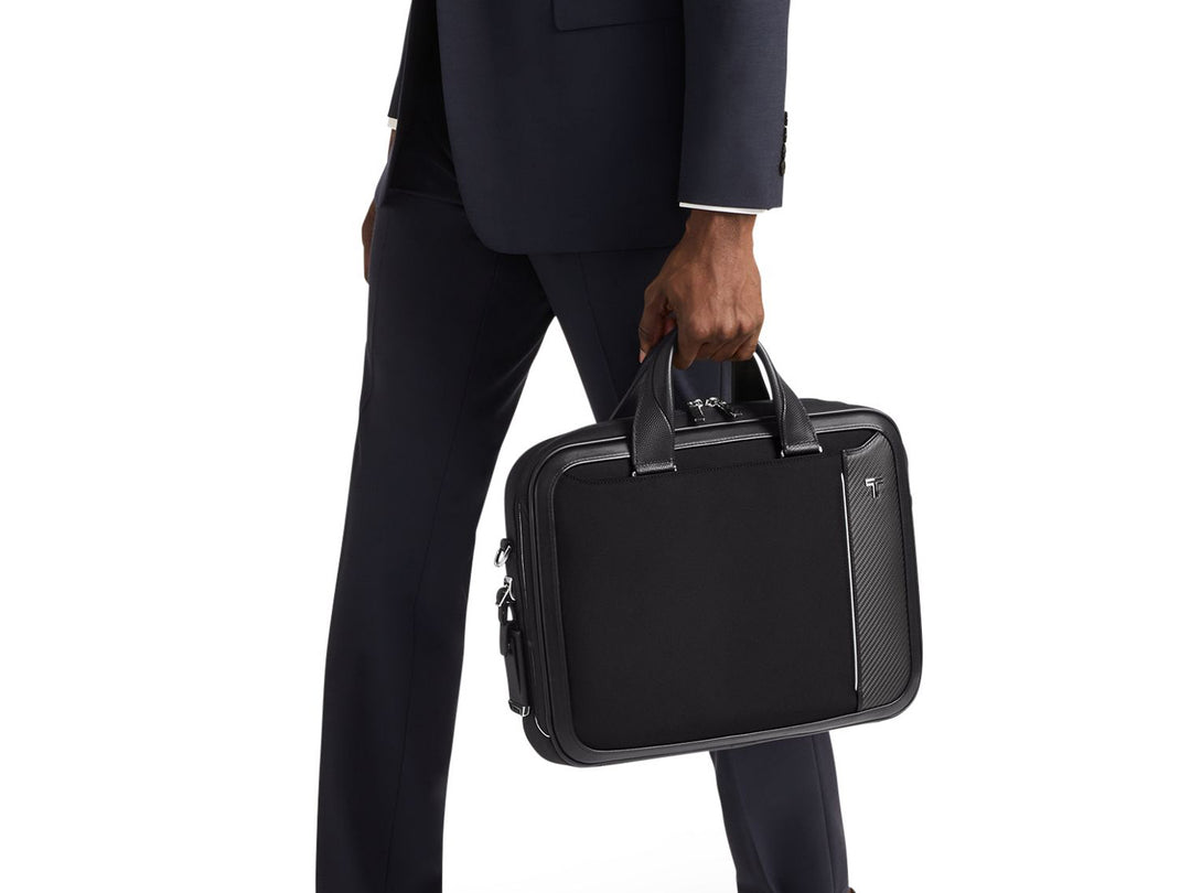 Professional carrying TUMI Arrivé Hannover carbon fiber laptop brief lifestyle image