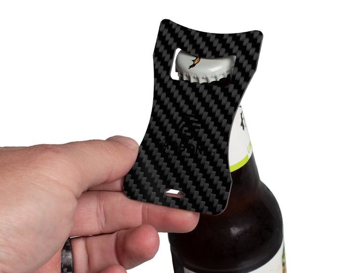 Effortless bottle opening with the CarbonFG Carbon Fiber Bottle Opener, shown in action with its durable design and stylish carbon fiber weave.