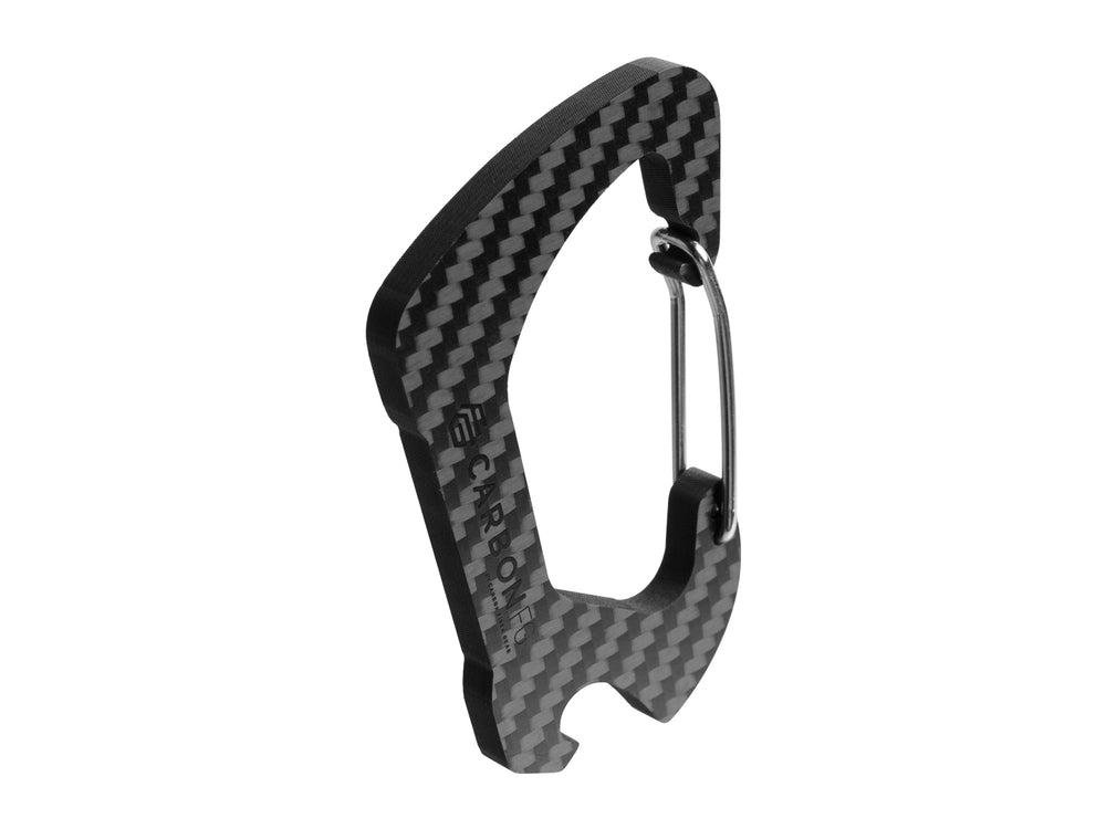 Angled view of the CarbonFG Carabiner Bottle Opener, highlighting the carbon fiber material and the integrated bottle opener feature.