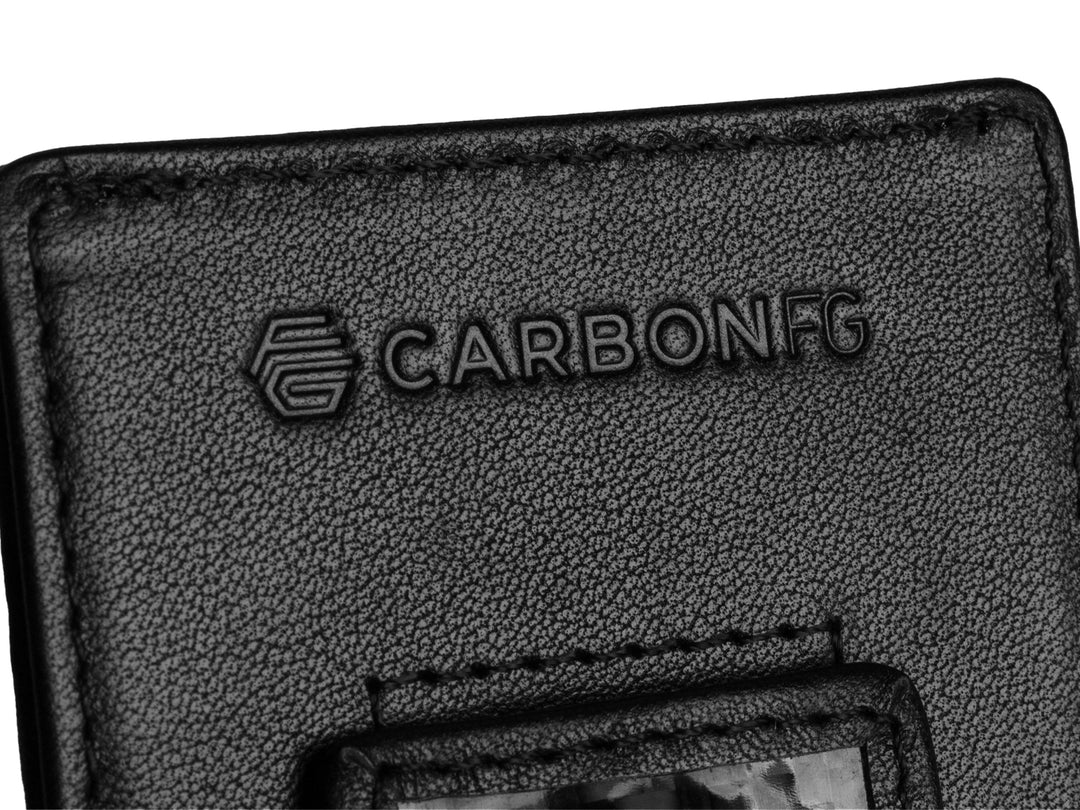Up close logo on carbon fiber money clip wallet