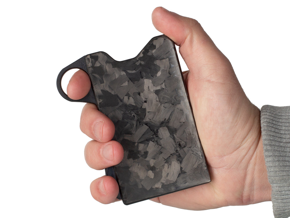 Grip6 forged carbon fiber wallet in hand