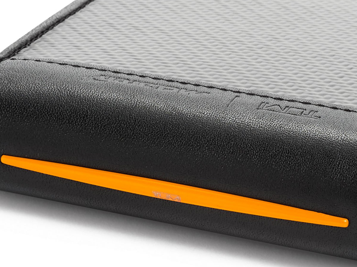 TUMI | McLaren Global Double Billfold Carbon Fiber Wallet up close on binding