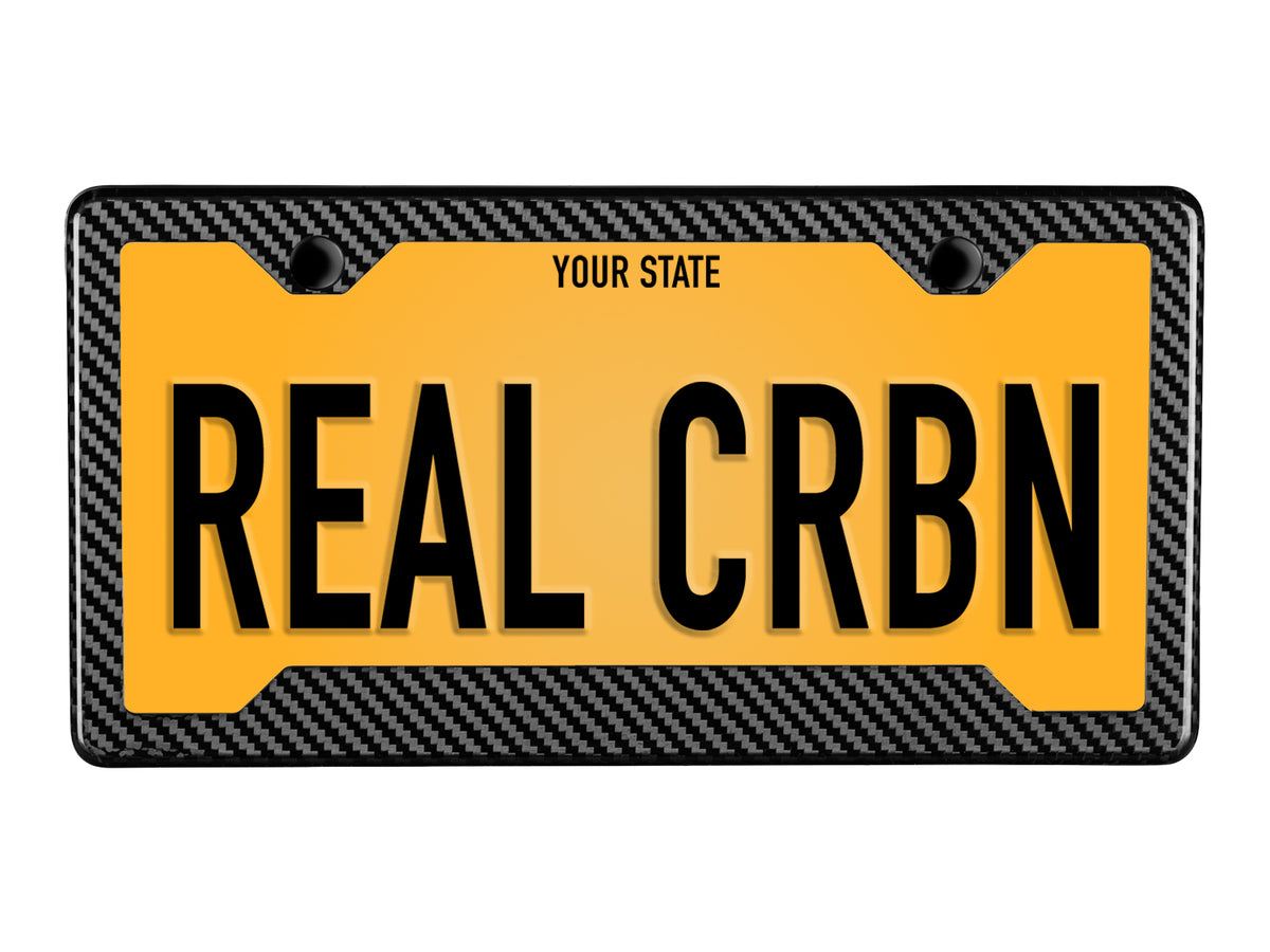 2-hole carbon fiber license plate frame with angled bottom with black caps and license plate example