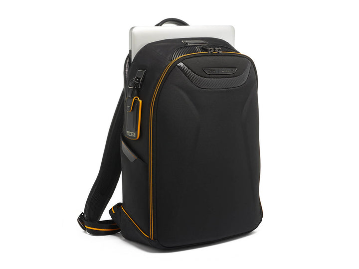 TUMI | McLaren Velocity Backpack with laptop compartment, showcasing functionality and style.