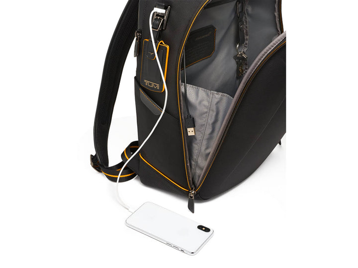 TUMI | McLaren Velocity Backpack with USB charging port, demonstrating tech-savvy convenience on the go.