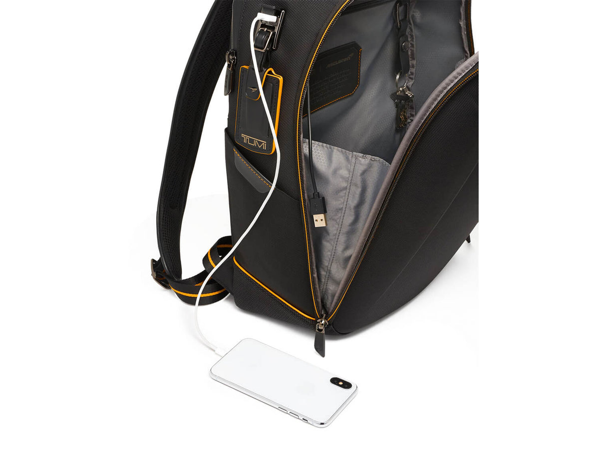 TUMI | McLaren Velocity Backpack with USB charging port, demonstrating tech-savvy convenience on the go.